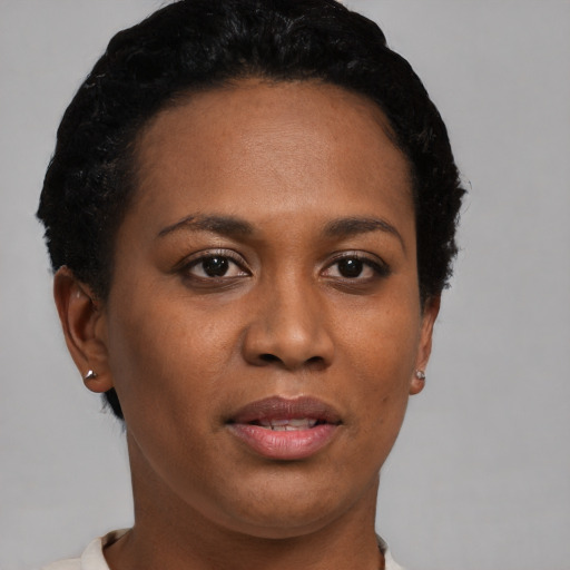 Neutral black young-adult female with short  brown hair and brown eyes