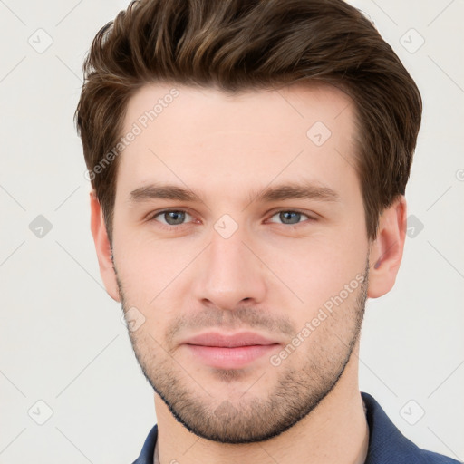 Neutral white young-adult male with short  brown hair and grey eyes