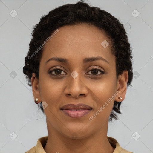 Joyful black young-adult female with short  brown hair and brown eyes