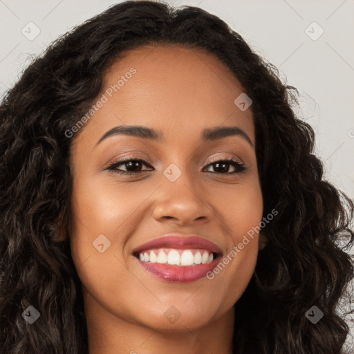 Joyful latino young-adult female with long  brown hair and brown eyes