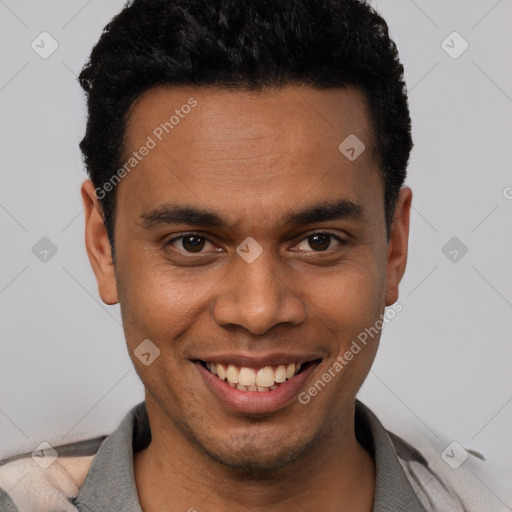 Joyful white young-adult male with short  black hair and brown eyes