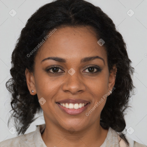 Joyful black young-adult female with medium  brown hair and brown eyes