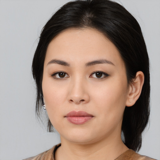 Neutral asian young-adult female with medium  black hair and brown eyes