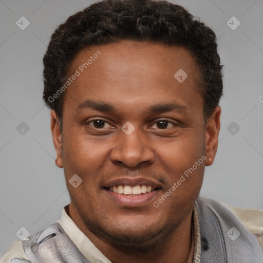 Joyful latino young-adult male with short  brown hair and brown eyes