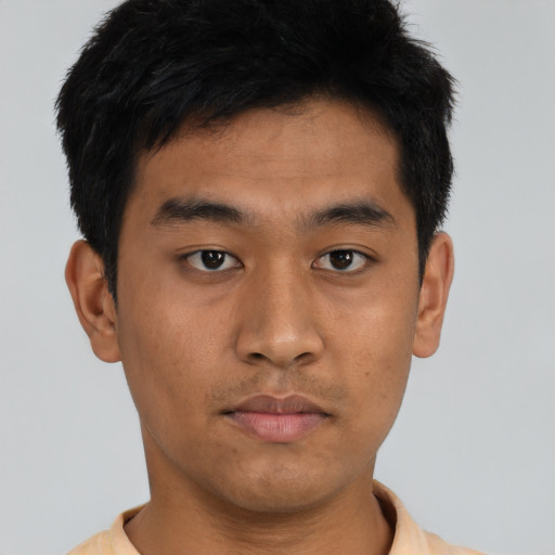 Neutral asian young-adult male with short  black hair and brown eyes