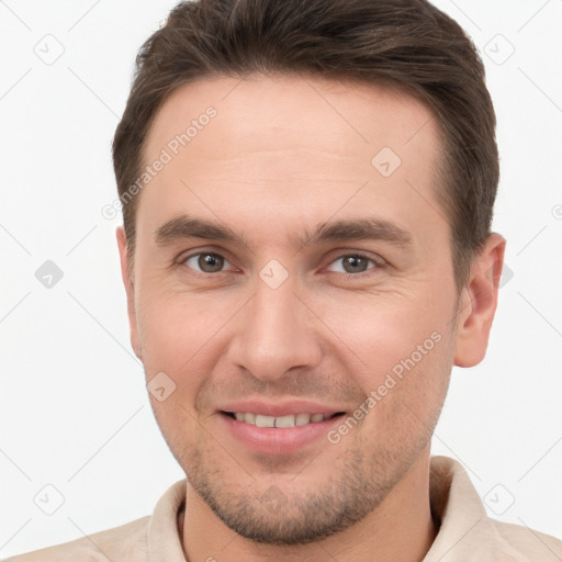 Joyful white young-adult male with short  brown hair and brown eyes