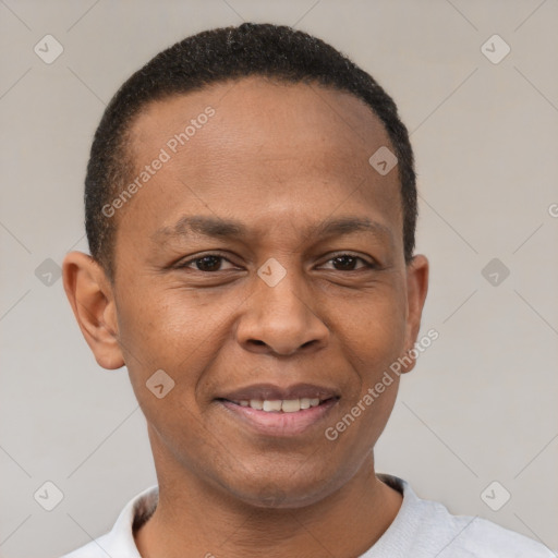 Joyful black young-adult male with short  brown hair and brown eyes