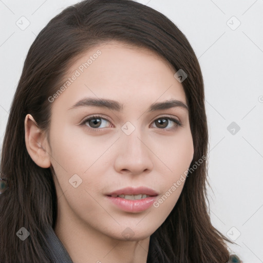 Neutral white young-adult female with long  brown hair and brown eyes