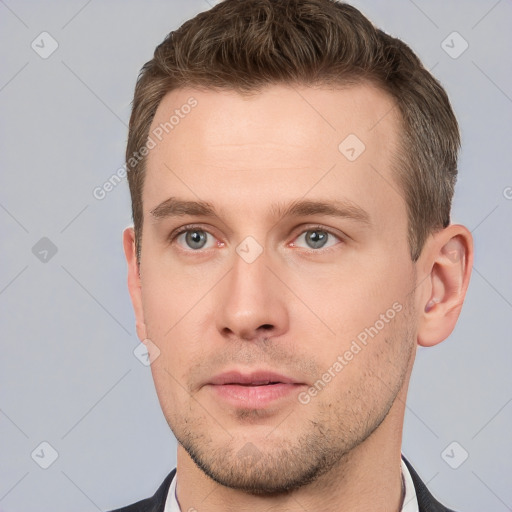 Neutral white young-adult male with short  brown hair and grey eyes