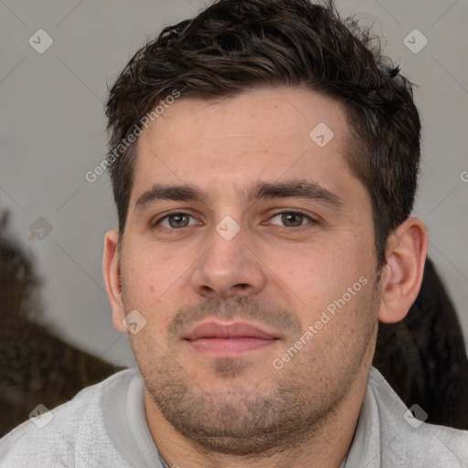 Neutral white young-adult male with short  brown hair and brown eyes