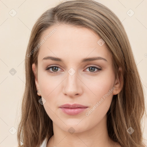 Neutral white young-adult female with long  brown hair and brown eyes