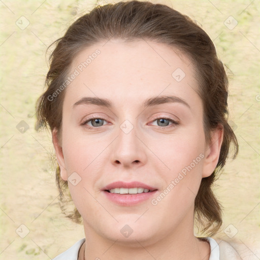 Joyful white young-adult female with medium  brown hair and grey eyes