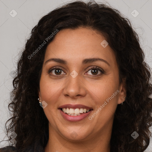 Joyful white adult female with long  brown hair and brown eyes