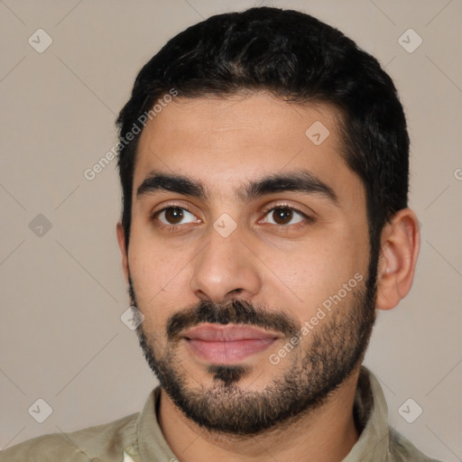 Joyful latino young-adult male with short  black hair and brown eyes