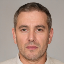 Neutral white adult male with short  brown hair and brown eyes