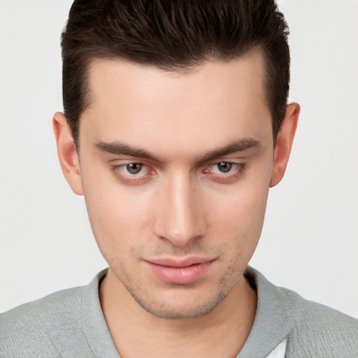 Neutral white young-adult male with short  brown hair and brown eyes