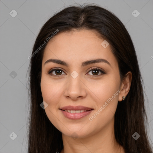 Joyful white young-adult female with long  brown hair and brown eyes