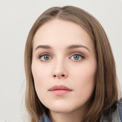 Neutral white young-adult female with long  brown hair and grey eyes