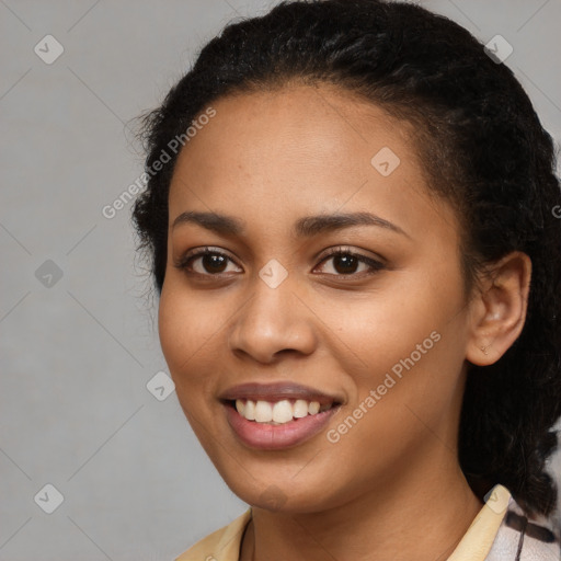 Joyful black young-adult female with medium  brown hair and brown eyes