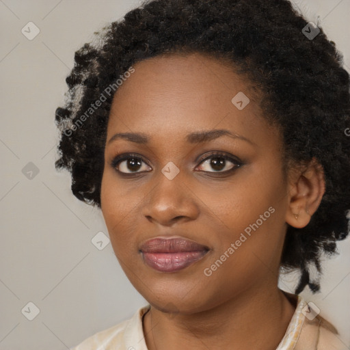 Joyful black young-adult female with medium  black hair and brown eyes