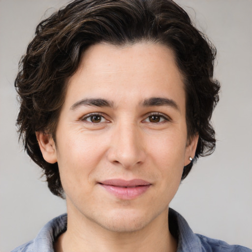 Joyful white young-adult male with medium  brown hair and brown eyes