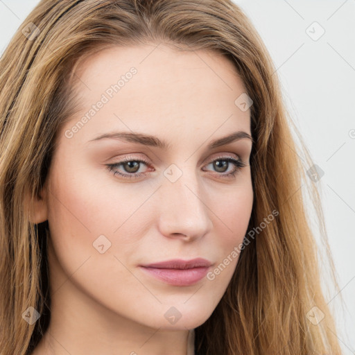 Joyful white young-adult female with long  brown hair and green eyes