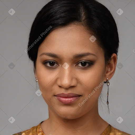 Joyful latino young-adult female with medium  brown hair and brown eyes