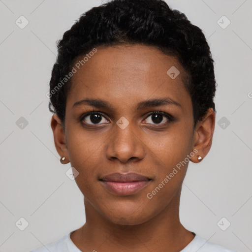 Joyful black young-adult female with short  black hair and brown eyes