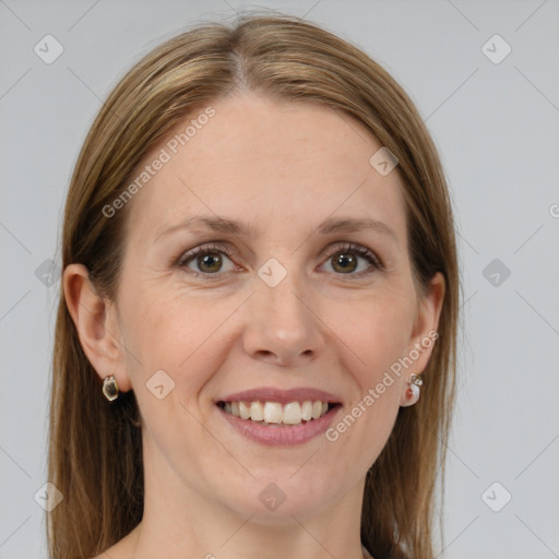 Joyful white adult female with medium  brown hair and grey eyes