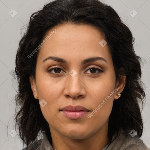 Joyful latino young-adult female with long  brown hair and brown eyes