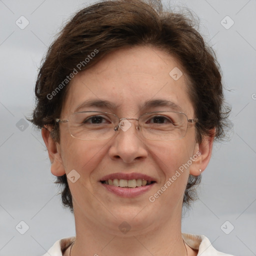 Joyful white adult female with short  brown hair and brown eyes