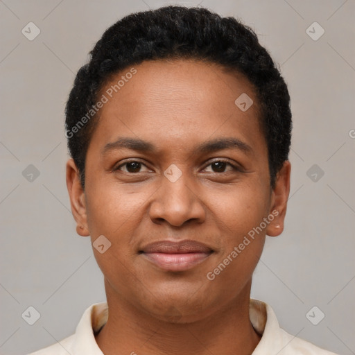 Joyful black young-adult female with short  brown hair and brown eyes