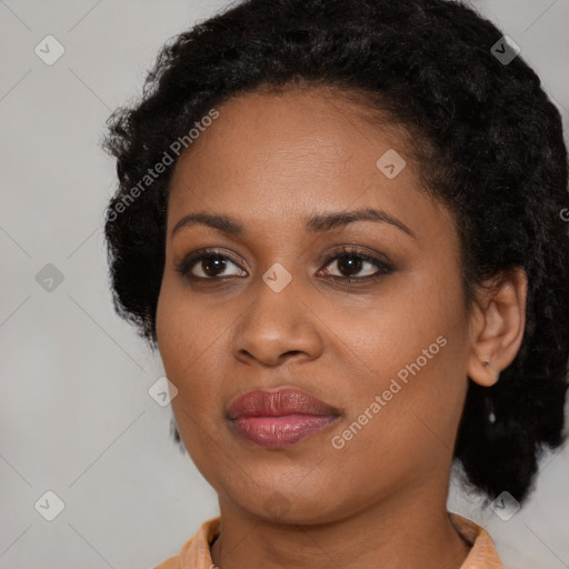 Joyful black young-adult female with medium  brown hair and brown eyes