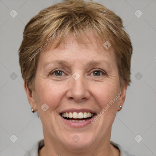 Joyful white adult female with short  brown hair and grey eyes