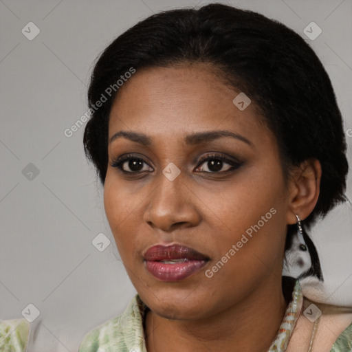 Joyful black young-adult female with medium  black hair and brown eyes