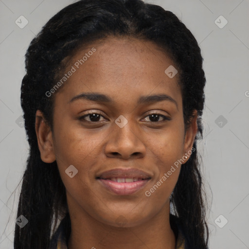 Joyful black young-adult female with long  brown hair and brown eyes