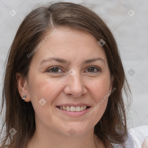 Joyful white adult female with long  brown hair and brown eyes