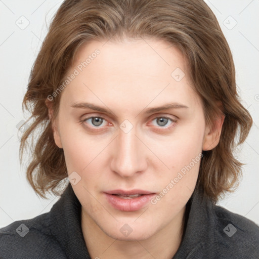 Joyful white young-adult female with medium  brown hair and blue eyes