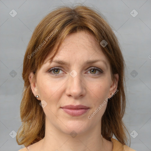 Joyful white adult female with medium  brown hair and grey eyes