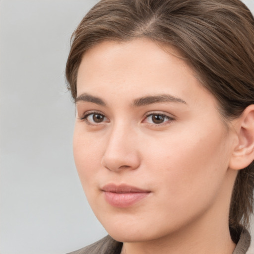 Neutral white young-adult female with medium  brown hair and brown eyes