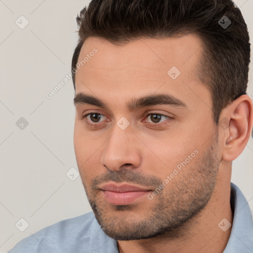 Neutral white young-adult male with short  brown hair and brown eyes