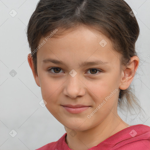 Joyful white child female with short  brown hair and brown eyes