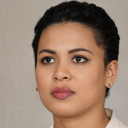 Neutral latino young-adult female with short  black hair and brown eyes