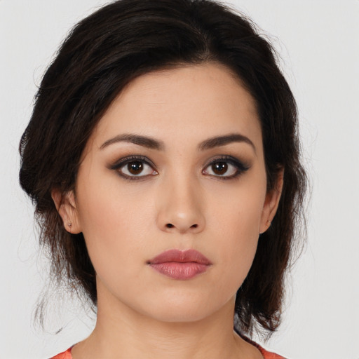 Neutral asian young-adult female with medium  brown hair and brown eyes