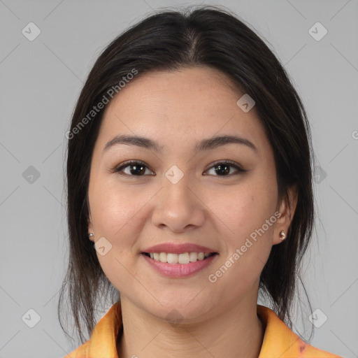 Joyful asian young-adult female with medium  brown hair and brown eyes