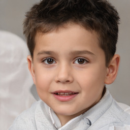 Joyful white child male with short  brown hair and brown eyes