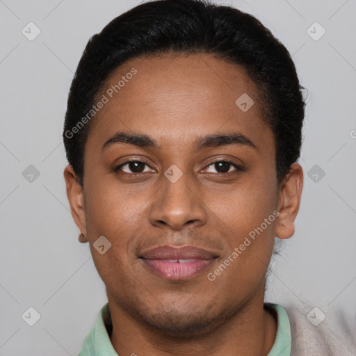 Joyful black young-adult male with short  brown hair and brown eyes