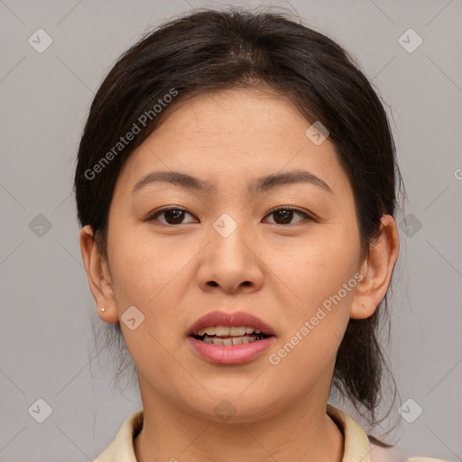 Joyful asian young-adult female with medium  brown hair and brown eyes