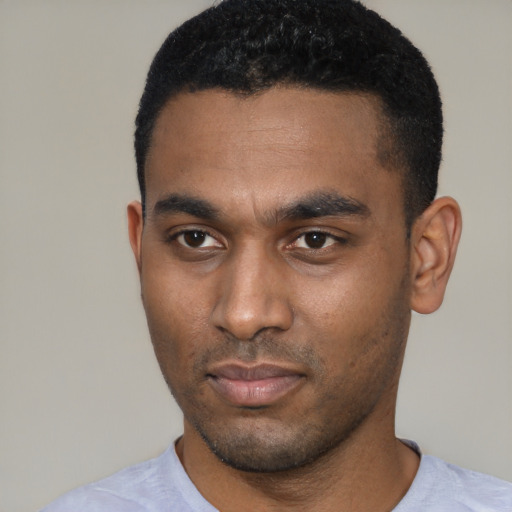 Neutral black young-adult male with short  black hair and brown eyes