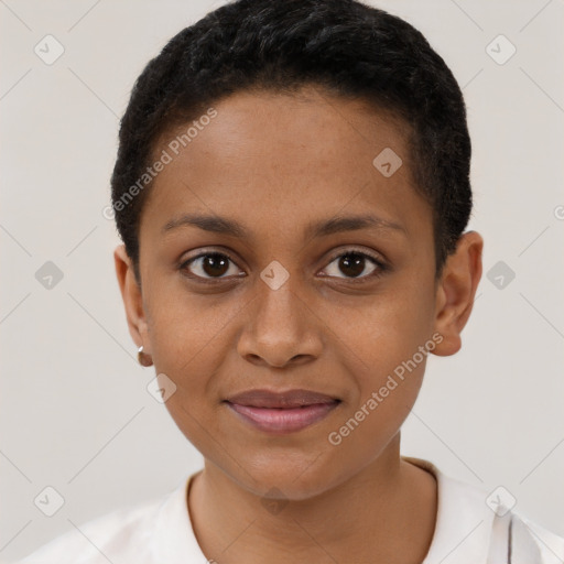 Joyful black young-adult female with short  brown hair and brown eyes